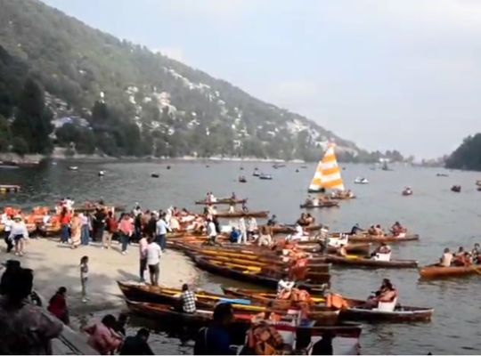 Nainital witnessed a deluge of tourists over the weekend, with Snow View, Tiffin Top and Mall Road bustling with activity throughout the day, with police on alert after implementing a traffic plan.
