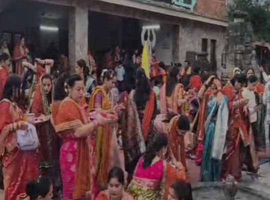 Celebrations of Karwa Chauth in the city of Baba Bagnath: Married women observe a waterless fast for the long life of their husbands.